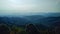 The view of mountain range in the background from Mount Angsi, Negeri Sembilan, Malaysia. Hiking and trekking image.