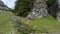 View of mountain rivulet flowing between huge stones, Dolomites, landscape