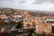 view from the mountain to Jerusalem in cloudy weather. Cars, light stone houses, solar panels on rooftops