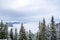 View from the mountain top Wallberg covered with snow on a cloudy day, Bavarian Alps, Bavaria, Germany