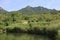 View of the mountain tops from the slope of Mount Beshtau near the small unnamed pond