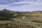 View of the mountain trail. The path to high mountain. The road to the highest mountain. Day trip in the mountains.