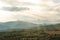 View of mountaine with olive tree plantations on sky background. Crete