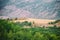 View of mountains Babadag in the clouds and a river Girdimanchay Lahij yolu from the side in Lahic village, Azerbaijan