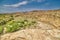 View of the mountains and the dry polluted riverbed in the highlands of Asia