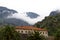 View of the mountains in the fog above the old town of Kotor.