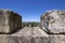 View of the mountains of Galilee through the lichen-covered stones of the ancient city of Zippori. Israel.