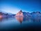 View on the mountains in the Hamnoy village, Lofoten Islands, Norway. Landscape in winter time during blue hour. Mountains and wat