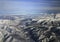 View of the mountains of the Kamchatka Peninsula in spring from the plane