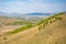 View with mountains, lake and valley from top of the rock - damn finger - in the mountainous Altai, Russia