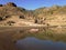 View of mountains and puddle in the Dam of Las NiÃ±as