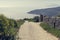 View of the mountains, road and the sea from the cliff