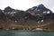 View of mountains and settlement from the water