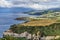 View on mountains, valleys, sea coastline of Sao Miguel island