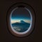 View of Mt. Fuji from the porthole of the plane