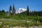 View of Mt. Rainier from Paradise parking lot, trail and meadow in foreground