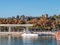 View of the `Muelle Uno` outdoor shopping mall, the marina, main park, Pompidou museum and the port of Malaga on a sunny day