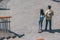 View of multicultural tourists walking on street