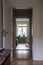 A view through multiple doors and rooms towards a window in a Scandinavian Swedish apartment from the year 1930