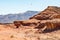 View on Mushroom and a half rock surrounded by rocky mountains in Timna National Park in Aravah Valley desert in Southern Israel