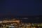 View of Nafplio town and harbour from Prophet Helias or Profitis Ilias hill at night. Argolis, Peloponnese, Greece