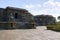 View of Nandi Mandapa and Hoysaleshwara Temple, Halebid, Karnataka. View from South West.