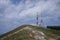 View from Nanos peak or plateau towards the antenna beacons above. Some clouds are visible on the sky. High antennas, 5g radio and