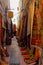 View on narrow alley in medina of arabian town with woven berber rugs carpets hanging on