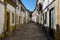 View of a narrow cobblestone street in the village of Nisa, Alentejo, Portugal