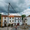 View of narrow main square consisting of limestone cozy yellow and white houses at Constancia in the Santarem District