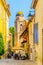 View of a narrow street in the center of Saint Tropez with a Chapelle de la Miséricorde, France