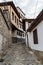 View of a narrow street in historical part of Plovdiv Old Town. Typical medieval colorful buildings.