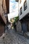 View of a narrow street in  historical part of  Plovdiv Old Town. Typical medieval colorful buildings.