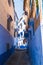 View of the narrow streets of the Chefchaouen city in Morocco, known as the blue city