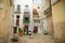 View of a narrow sunny street in the city Bari