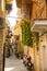 View of a narrow sunny street in the city Bari