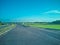 View of national highway through farmland