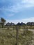 View of National park in North Germany with vacation home, dunes and path