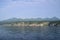 View from nature boat cruise on Okhotsk sea towards sea cliff and Shiretoko mountain range, Hokkaido, Japan.