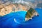 View of Navagio beach, Zakynthos Island, Greece. Aerial landscape. Azure sea water. Top view from a drone.