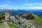 View of Nenana river valley from Mount Healy hike trail with blue sky with white clouds above. Denali National Park and