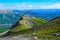 View of Nenana river valley from Mount Healy hike trail with blue sky with white clouds above. Denali National Park and