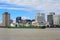 View of New Orleans downtown with cargo ship in the Mississippi river.