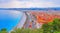 View of Nice city, Beach at sunset, Promenade des Anglais, Cote d`Azur, French riviera, France