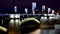 View of the night city.  lights on the suspension bridge at night. Bridge defocused abstract city night lights background