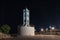 View at night on the lighthouse on the embankment in the old port of Tel Aviv in Israel