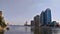 A view of the Nile Corniche in Cairo, showing the towers of the National Bank of Egypt and the Nile City towers with the reflectio