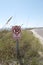 A view of a No Parking sign along the roadway Mobile Bay at Dauphin Island Alabama