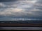 View from Northam Burrows to Fullabrook wind farm, North Devon, England on a stormy day.