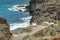 View of northeast of La Gomera Island. Beautiful rocky ocean coast with breaking waves. Playa De Caleta, La Gomera, Canary islands